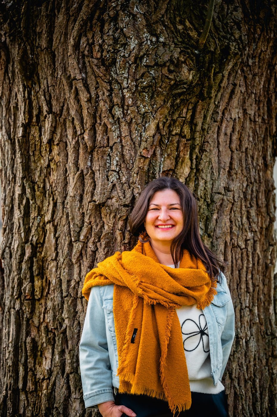Muriel against a large tree
